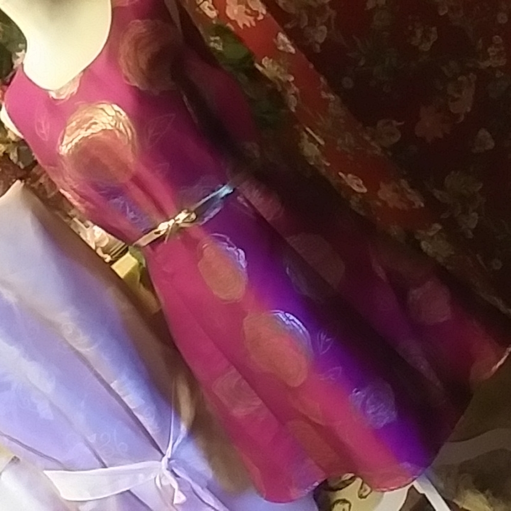 The color is fuchsia accent with gold leaves and gold belt